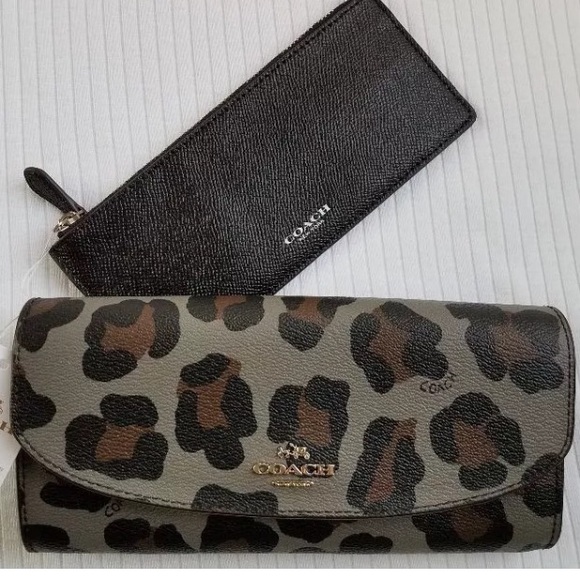 Coach Handbags - Authentic COACH slim ocelot print w Pouch wallet.